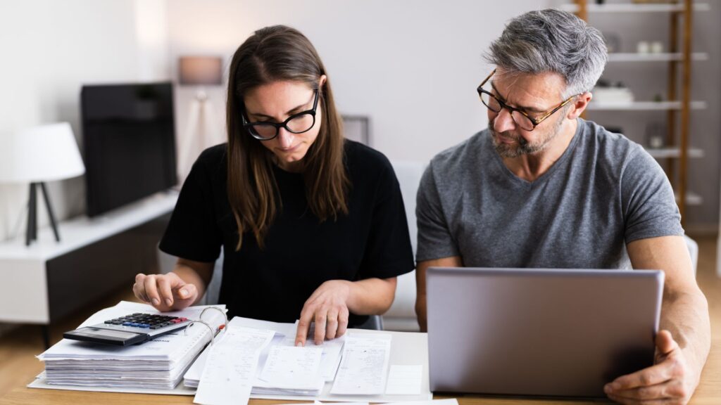 couple looking over taxes